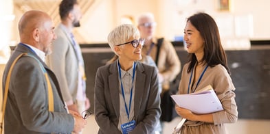Business people talking at a trade show
