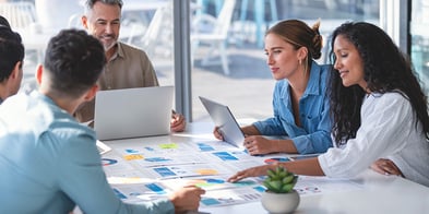 Marketing team planning a website redesign budget